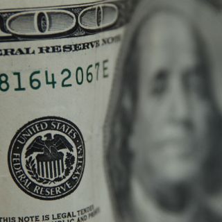 Cuba elimina gravamen al dólar