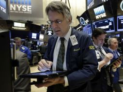 El compuesto Nasdaq cerró en terreno positivo con el aumento de 20 enteros. AP / R. Drew