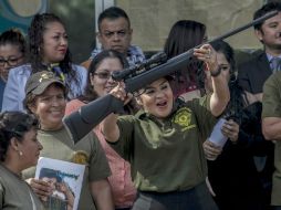 Enfundada en la camiseta verde militar y la gorra de los policías comunitarios, fue recibida por decenas de organizaciones. SUN / Y. Xolalpa
