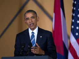 La firma ocurre dos días antes de la visita de Obama a Argentina el miércoles y jueves. EFE / O. Barría