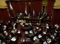 La ley posibilitará al Gobierno pagar a aquellos acreedores que poseen títulos argentinos en mora desde finales de 2001. AP / N. Pisarenko
