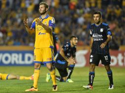 Gignac marcó los dos tantos que le dieron el pase a los felinos. EFE / M. Sierra