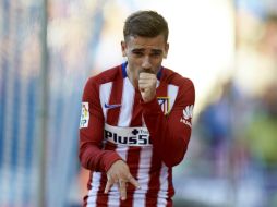 El delantero francés del Atlético de Madrid Antoine Griezmann celebra la consecución del segundo gol de su equipo. EFE / A. García