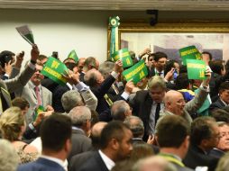La votación supone una derrota para Rousseff, cuyo gobierno ya preveía perder la oportunidad de frenar el proceso. AFP / E. Sa