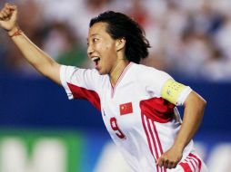 Wen dejó las canchas en 2003, escribiendo en lo más alto su nombre. AFP / ARCHIVO