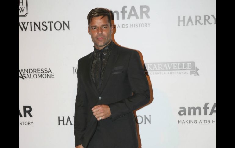 El más esperado fue el cantante Ricky Martin quien pasó tímidamente frente a las cámaras. EFE / S. Moreira