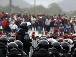 Las manifestaciones dejaron un saldo de cinco autos quemados y 22 detenidos. NTX / ARCHIVO