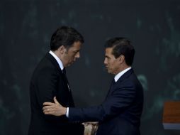 En conferencia de prensa conjunta, Renzi afirma que Italia trabajará en diversas iniciativas que podrán aprovechar mexicanos. AFP / Y. Cortez