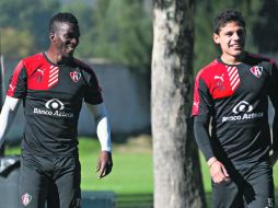 Franco Arizala y Alfonso González durante el entrenamiento del Atlas en las instalaciones de La Madriguera. EL INFORMADOR / S. Molina