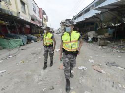 En las zonas de desastre participan policías, rescatistas y miembros de los cuerpos de bomberos del país. AFP / R. Buendia