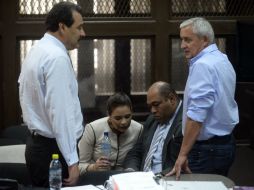 El magistrado rechazó la suspensión luego del pronunciamiento de los abogados de los 11 sospechosos y del Ministerio. AFP / J. Ordonez