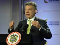 Santos anunció el rediseño de su gobierno con la mira puesta en una pronta firma de la paz con las FARC. EFE / J. Bello