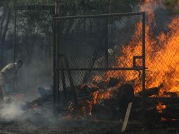 Bomberos de Zapopan, Tlaquepaque y Guadalajara se encuentran en el lugar. EL INFORMADOR / R. Tamayo