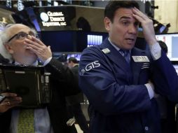 El principal indicador de Wall Street registró una caída, arrastrado por Apple y el Banco Central de Japón. AP / R. Drew