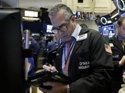 Los indicadores industriales reportan caída durante los primeros minutos de esta sesión. AP / ARCHIVO