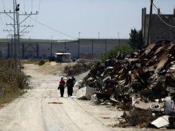 Cuatro civiles palestinos resultaron heridos en uno de los bombardeos israelíes en Gaza antes del amanecer. AFP / M. Abed