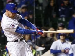 Ben Zobrist. El jugador de los Cachorros conecta un cuadrangular en el octavo episodio ayer en el Wrigley Field. AP / N. Huh