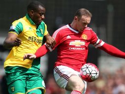 El encuentro se decidió hasta el minuto 72, cuando Wayne Rooney dio un pase a Mata, que terminó batiendo al guardameta Ruddy. AFP / J. Tallis