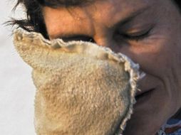 Sensación de calor sofocante, piel seca, decaimiento, dolor de cabeza, mareos, náusea y vómito; algunos síntomas. AFP / ARCHIVO