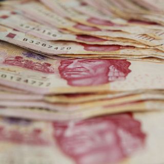 Reservas internacionales bajan 237 millones de dólares