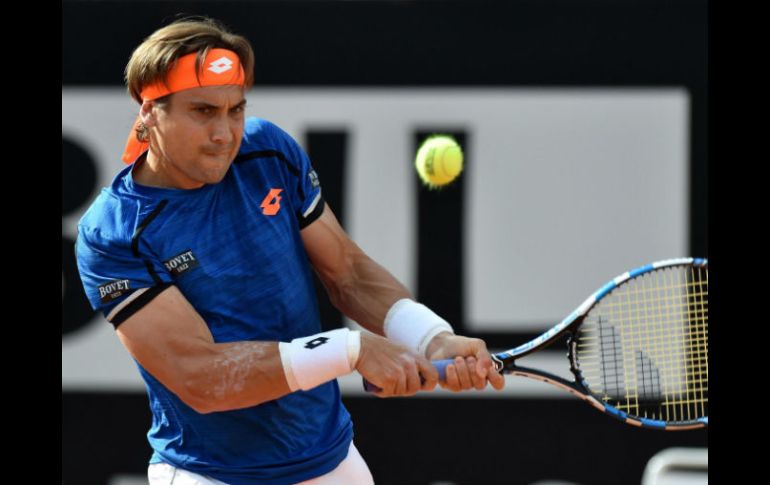 Luego de verse por debajo en el primer set, Ferrer consigue de manera complicada su boleto a la siguiente ronda. AP / E. Ferrari