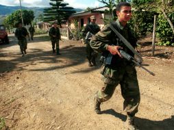 El funcionario asegura que el Ejército colombiano no ha hecho algo que ponga en discusión la voluntad de colaborar. AP / ARCHIVO