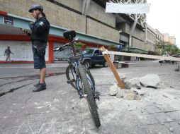Comercios del centro de Guadalajara registraron daños en su fachada. EL INFORMADOR / R. Tamayo