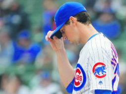 Kyle Hendricks. El pitcher abridor de los Cachorros reacciona tras una carrera de los Padres en el primer inning. AFP / J. Durr