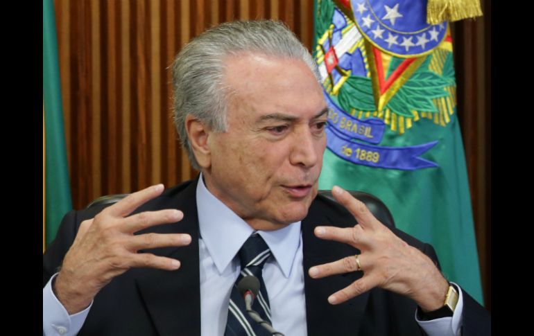 Temer afirma que con la ayuda de todos quiere encarrilar al país. AP / E. Peres