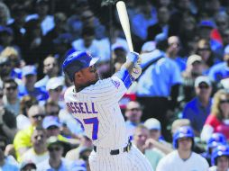 La vuela. Addison Russell conecta jonrón en el cuarto inning. AP / M. Marton