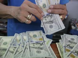 El Banxico informa que el tipo de cambio para solventar obligaciones se ubica en 18.3217 pesos. EL INFORMADOR / ARCHIVO