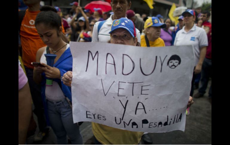 Se tiene previsto marchar a la sede del Consejo Nacional Electoral donde esperan entregar las 1.8 millones de firmas que recolectaron. AP / ARCHIVO