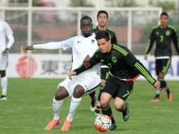 Arturo González puso adelante a los mexicanos al minuto cuatro, pero apenas cinco minutos después llegó el empate. AFP / B. Horvat