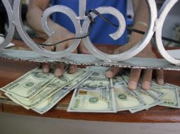 El Banco de México informa que el tipo de cambio en moneda extranjera en el país es de 18.5465 pesos este día. EL INFORMADOR / ARCHIVO