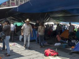 Norma López asegura les dieron indicaciones de subir a los camiones, para ser escoltados por la Policía Federal a su lugar de origen. SUN / ARCHIVO