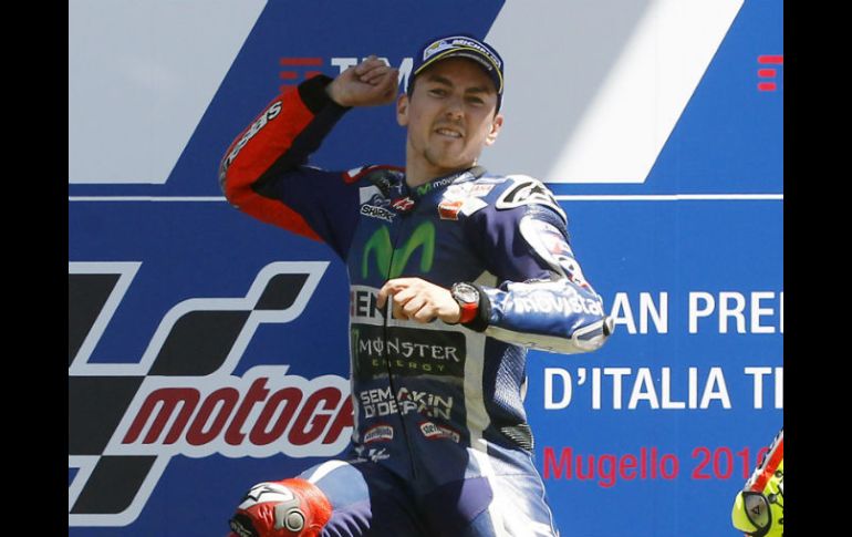 Lorenzo firma su victoria 64 de su carrera, y la tercera en la seis carreras disputadas este año. AP / a. Calanni