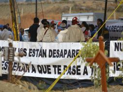 En marzo de 2014 autoridades de la Fiscalía depositaron 116 cuerpos en la fosa de Tetelcingo. SUN / T. Rivera