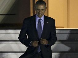 Barack Obama llegó en su avión presidencial procedente de Hanói, Vietnam. EFE / K. Ota