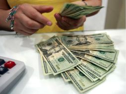 De acuerdo con Banco base, el peso mexicano se aprecia, a la par de la recuperación de los precios del petróleo. EL INFORMADOR / ARCHIVO