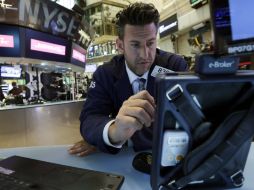 El nasdaq sumó 6.88 puntos hasta cuatro mil 901.77 unidades. AP / ARCHIVO