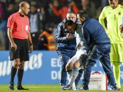 Messi sufre una ''importante contusión ósea y de partes blandas de la parrilla costal izquierda'', tras el amistoso ante Honduras. AFP / E. Abramovich