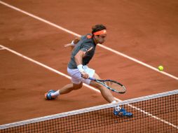 Será la sexta vez consecutiva en la que Ferrer dispute los octavos de Roland Garros. AFP / M. Bureau