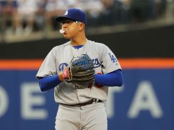 El zurdo permitió tres carreras con cinco hits, dio cuatro bases por bolas y ponchó a tres. AFP / ARCHIVO