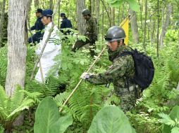 Más de un centenar de policías y bomberos participaron en las tareas de búsqueda del menor desde el sábado pasado. AP / D. Suzuki