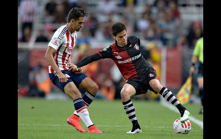 'Ponchito' González (derecha) se convirtió en la figura de los Rojinegros del Atlas. MEXSPORT / I. Ortiz