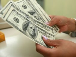 El banxico informa que el tipo de cambio para solventar oblihaciones es de 18.9814 pesos. EL INFORMADOR / ARCHIVO