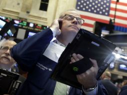 La bolsa logró interrumpir una racha de pérdidas de cinco jornadas consecutivas. AP / R. Drew