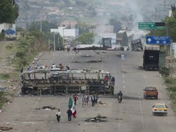 'Lo ocurrido el domingo 19 de junio de 2016 en Oaxaca puso ante los mexicanos un límite que nunca debimos rebasar', escriben. AP / E. Verdugo