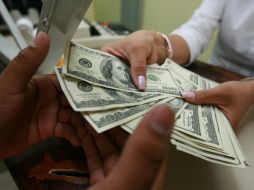 El Banxico fijo en 18.6444 pesos el tipo de cambio para solventar obligaciones. EL INFORMADOR / ARCHIVO