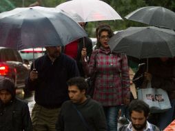 A pesar de que las temperaturas seguirpan siendo cálidas, la lluvia no dejará de caer, aunque en intervalos cortos. NTX / ARCHIVO